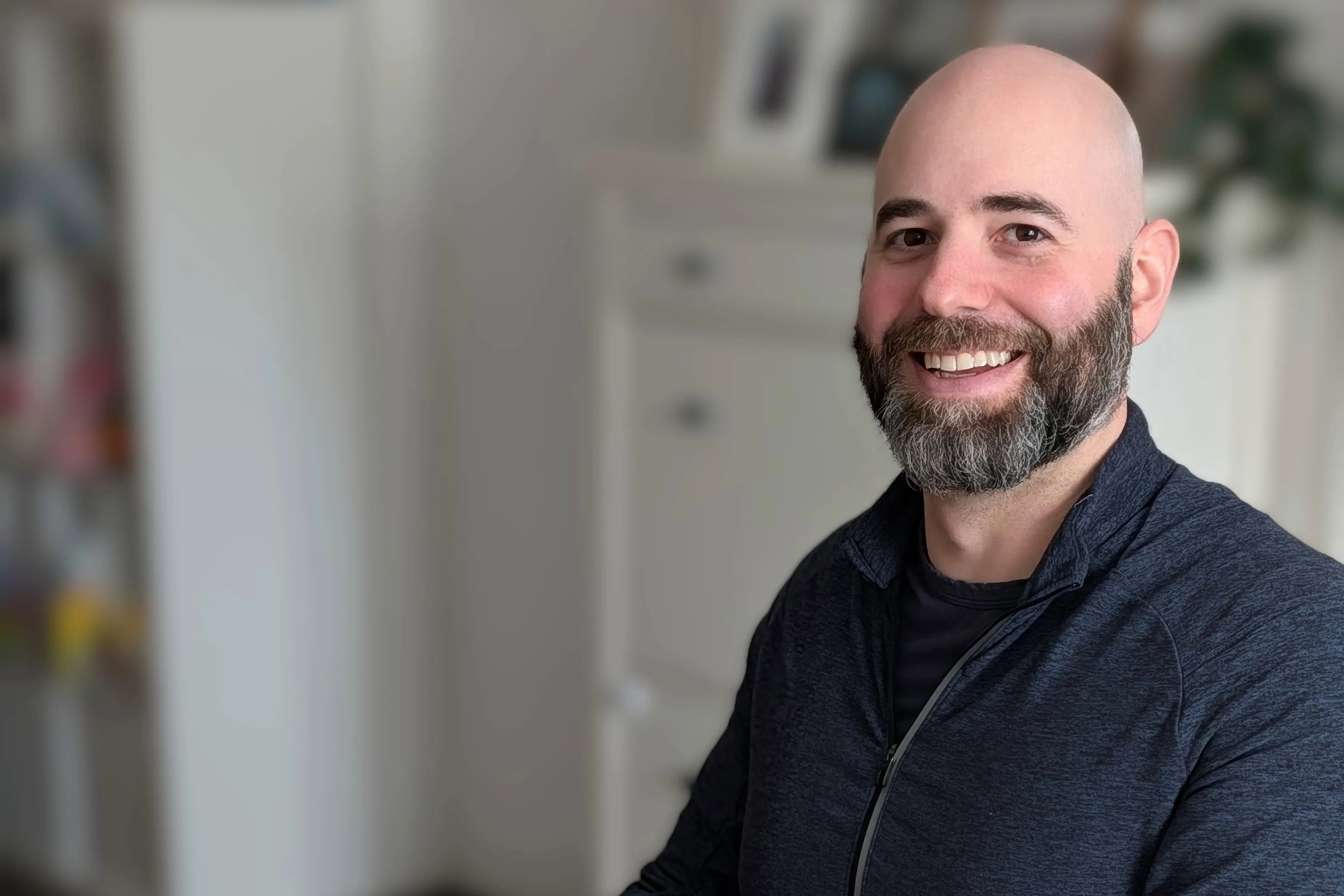 Founder of AR Productions, Andrew Rodrigues, works on his app Work Log from his Toronto home.